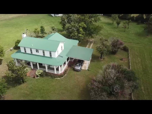 Aerial view of Mosh Farmhouse and surrounding eleven acres